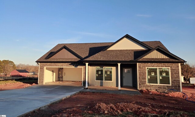 136 Jonah Rd, Gaffney, SC 29341 - view of front facade with covered porch, board and batten siding, and driveway
