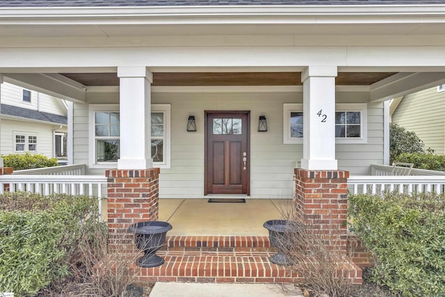 doorway to property with covered porch