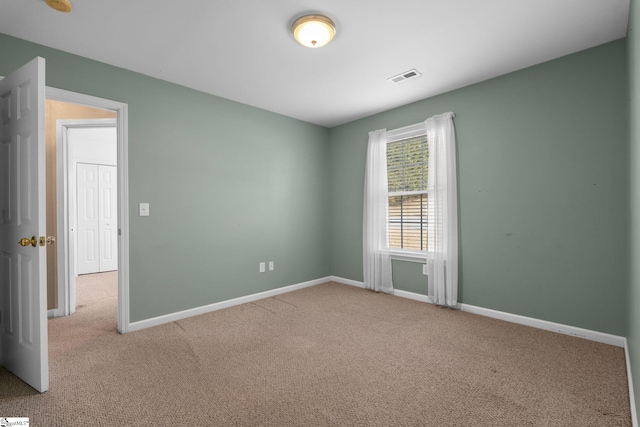 view of carpeted spare room