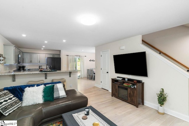 living room with light wood-type flooring