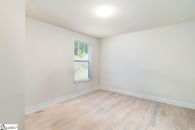 unfurnished room featuring light hardwood / wood-style flooring