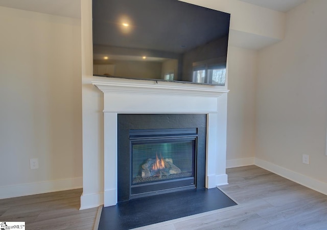 interior details featuring hardwood / wood-style floors