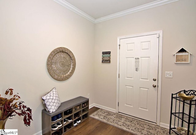 entryway with wood-type flooring and crown molding