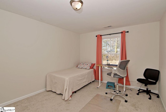 bedroom featuring carpet