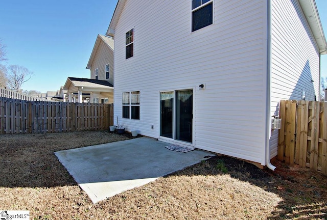 rear view of house featuring a patio area