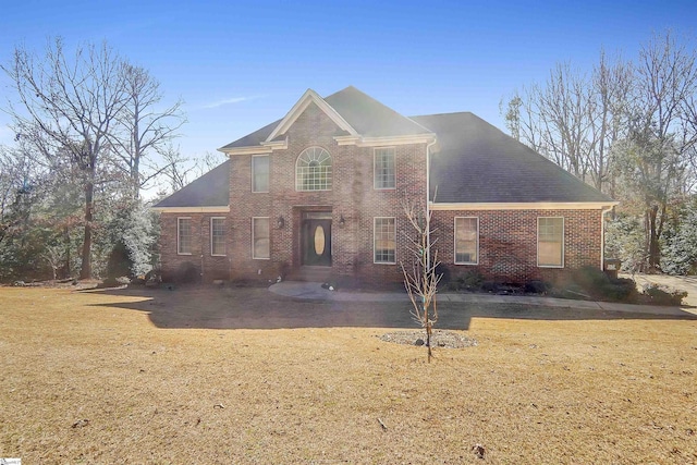 view of property featuring a front yard