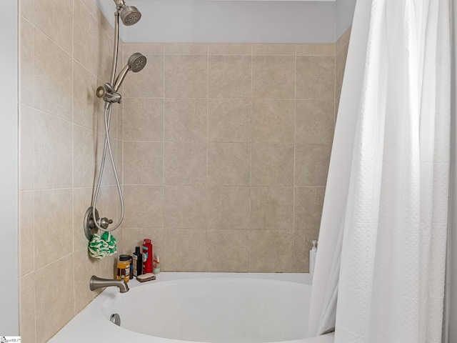 bathroom featuring shower / bath combination with curtain