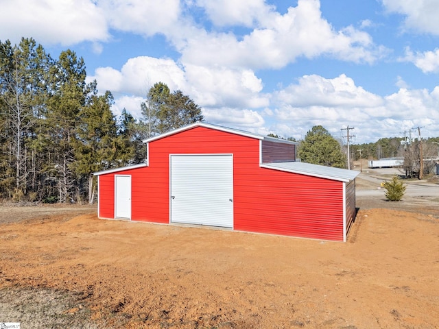 view of outdoor structure featuring a garage