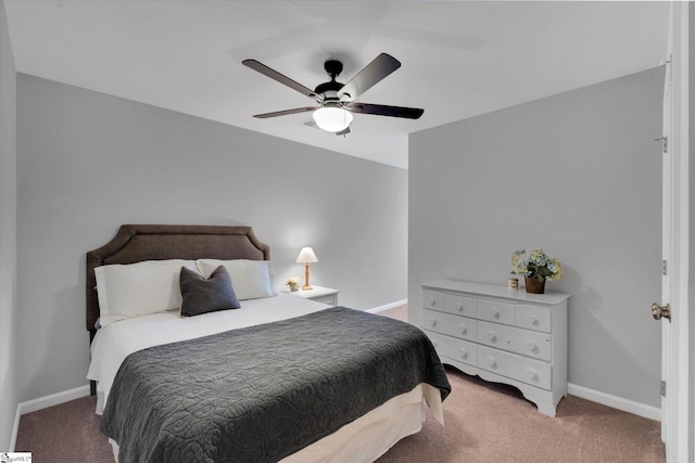 bedroom with ceiling fan and carpet floors