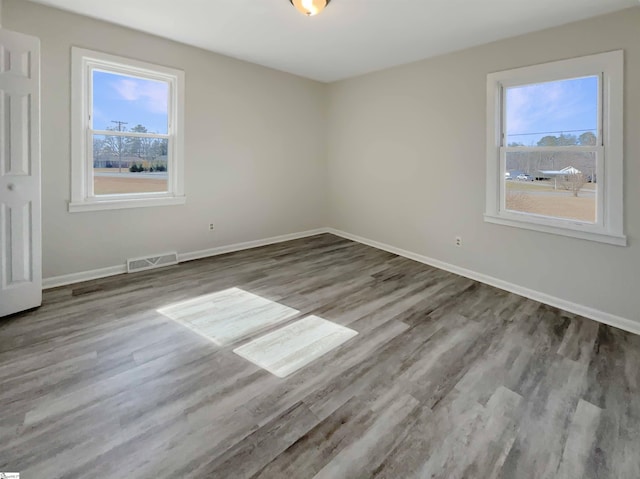 empty room featuring light hardwood / wood-style floors