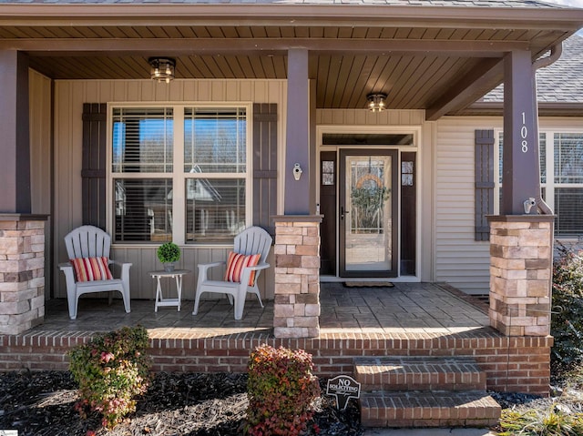 doorway to property with a porch