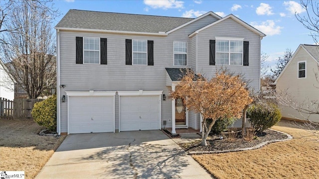 view of front of property featuring a garage