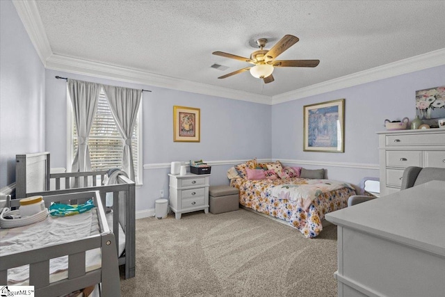 bedroom with ceiling fan, crown molding, light colored carpet, and a textured ceiling