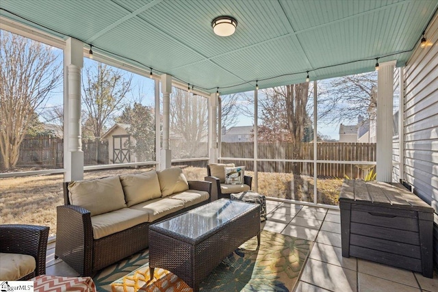 sunroom / solarium with a wealth of natural light