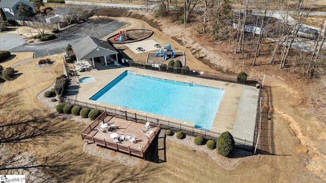 view of swimming pool featuring a patio area