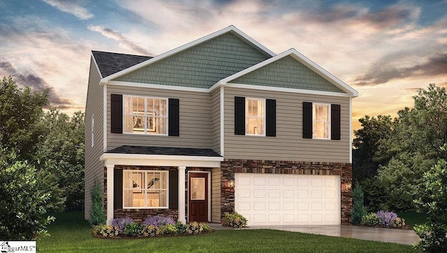 craftsman-style home with a garage and a lawn