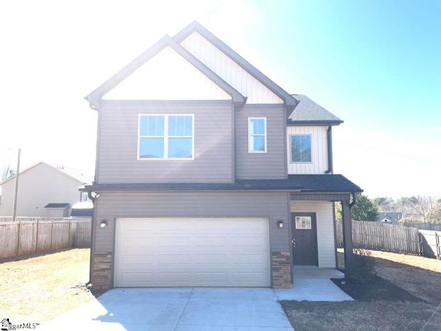 view of front of home with a garage