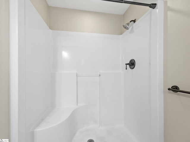 bathroom featuring walk in shower