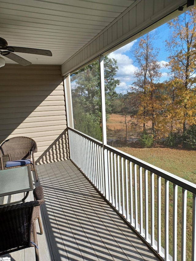 wooden terrace with ceiling fan