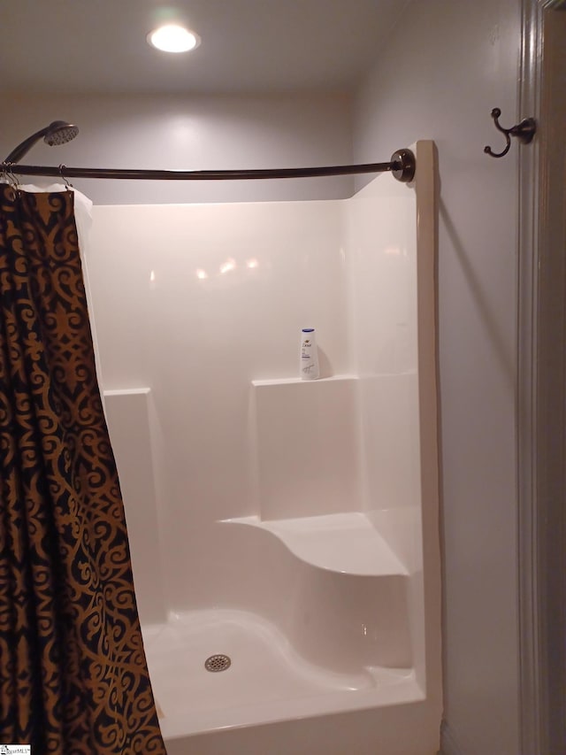 bathroom with walk in shower