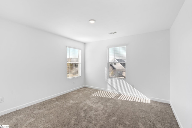 view of carpeted spare room