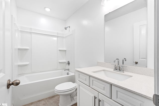 full bathroom featuring shower / washtub combination, vanity, tile patterned floors, and toilet