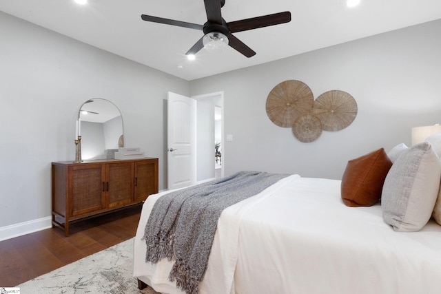 bedroom with hardwood / wood-style floors and ceiling fan