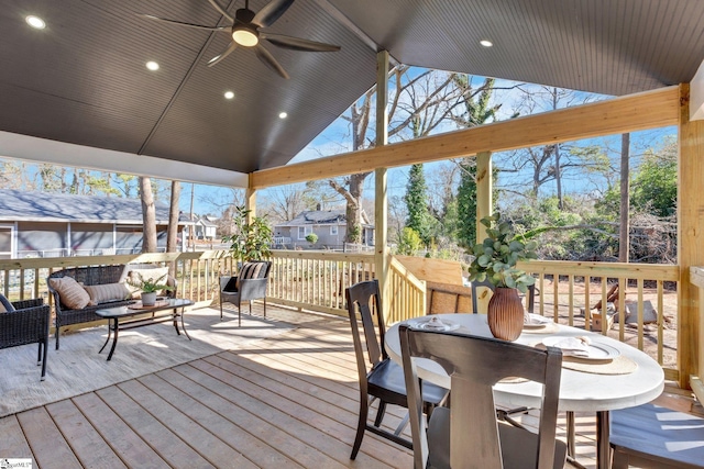 wooden deck featuring an outdoor hangout area and ceiling fan