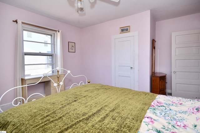 bedroom featuring ceiling fan