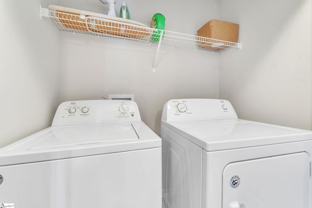 laundry area featuring separate washer and dryer