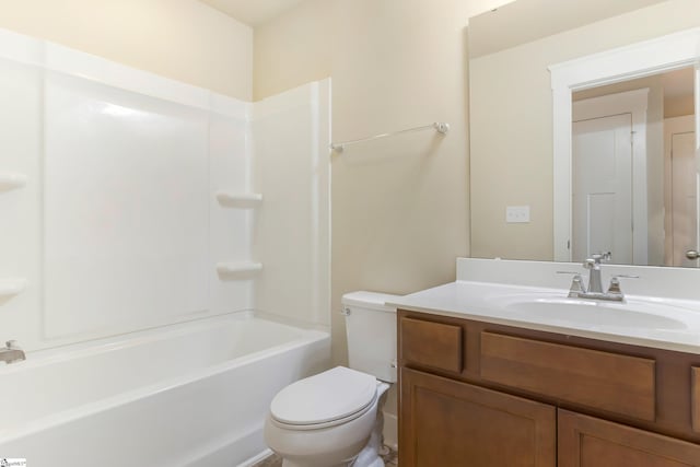 full bathroom with shower / bath combination, vanity, and toilet