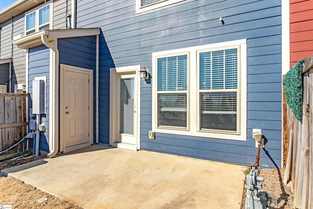 doorway to property with a patio area