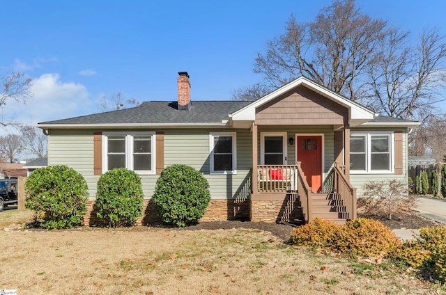 view of front of home with a front yard