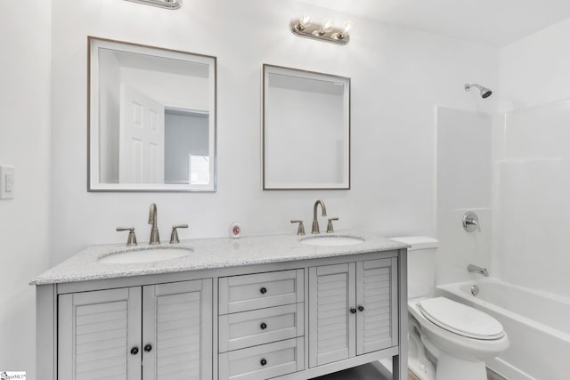 full bathroom featuring vanity, toilet, and shower / bath combination