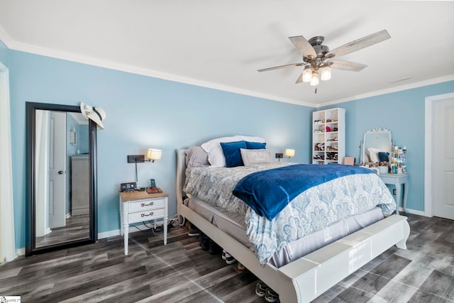 bedroom with crown molding, dark wood-type flooring, and ceiling fan