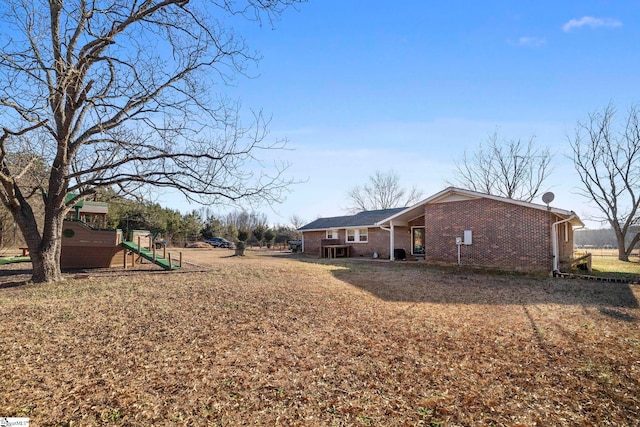 view of yard with a playground