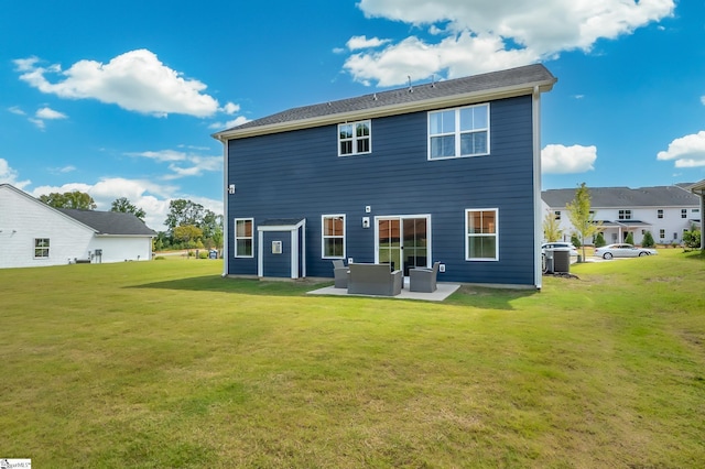 rear view of house with central AC unit, a lawn, outdoor lounge area, and a patio