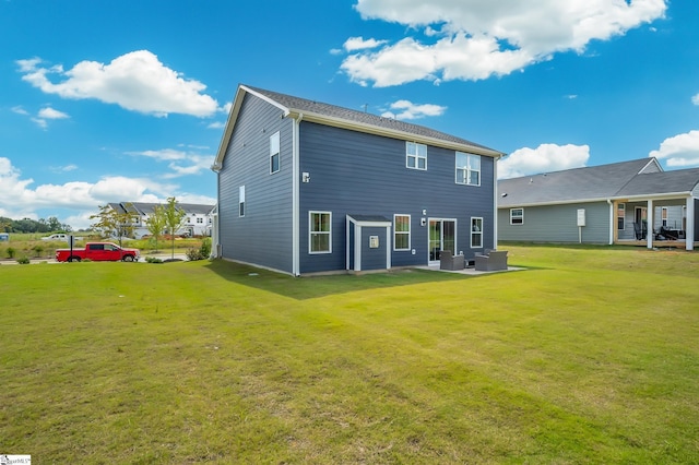 back of house with a yard