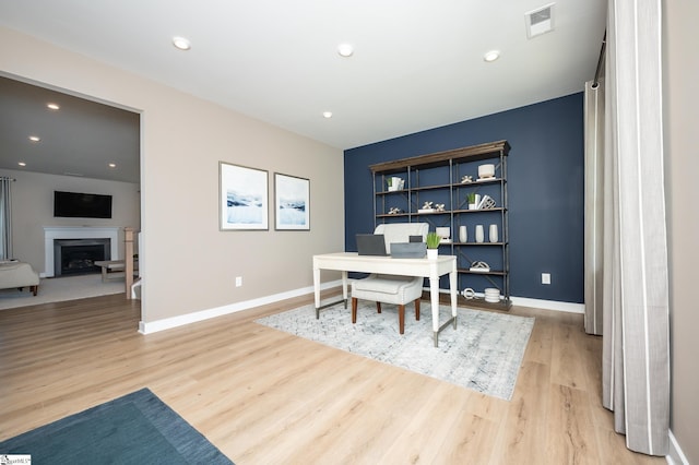 dining area with light hardwood / wood-style floors