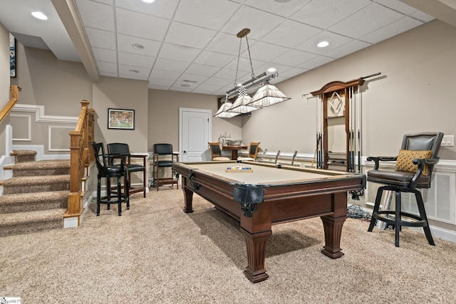 rec room featuring light carpet, a drop ceiling, and pool table