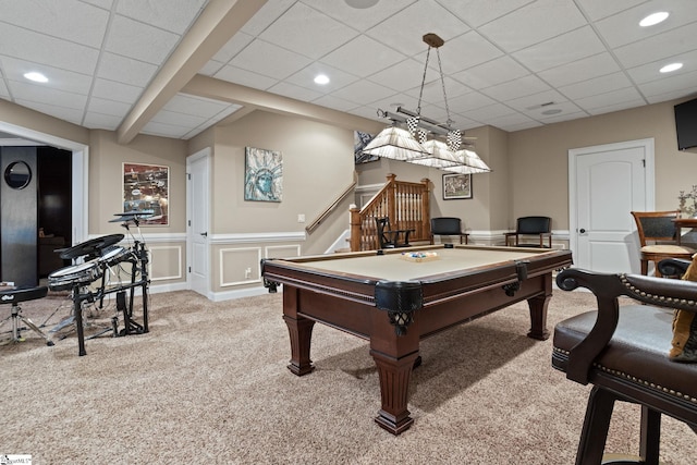 game room featuring a paneled ceiling and light colored carpet