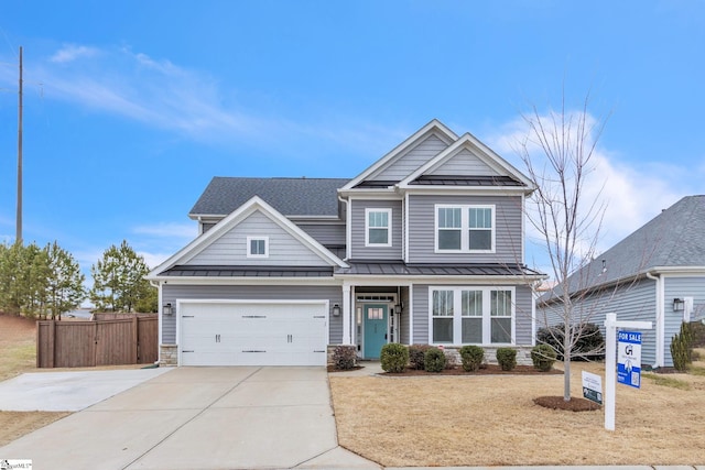 craftsman-style home with a garage