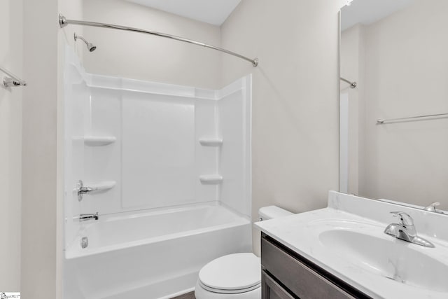 full bathroom featuring shower / bath combination, vanity, and toilet