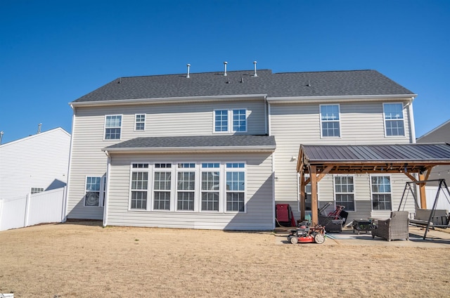 rear view of property with a patio