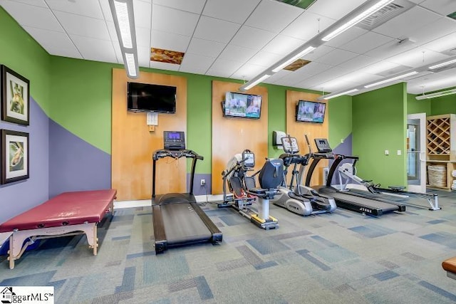 workout area featuring carpet