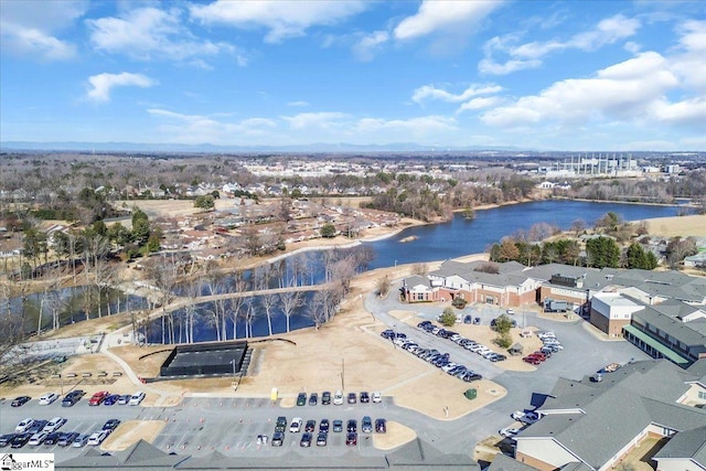 bird's eye view with a water view