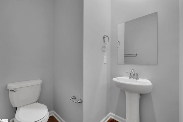 bathroom featuring toilet