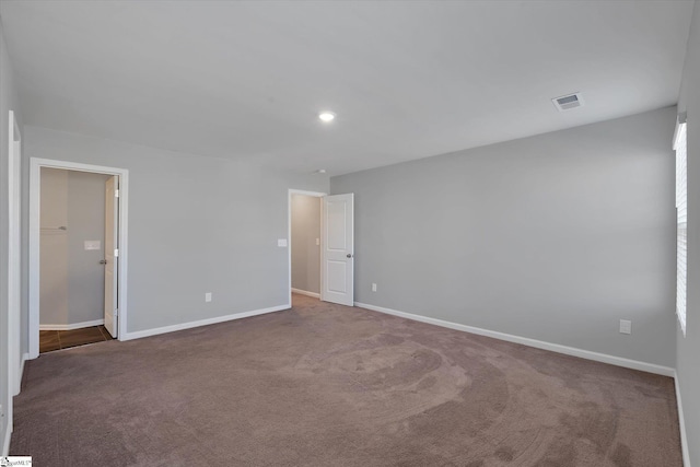 spare room with carpet floors