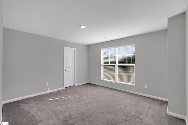 spare room with carpet flooring