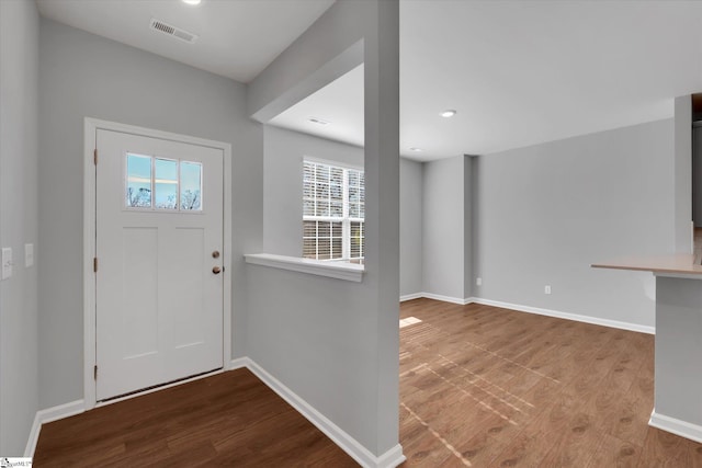 entryway with light hardwood / wood-style floors